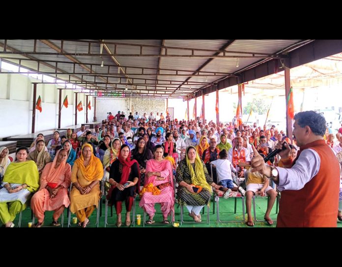 BJP candidate from Jammu Lok Sabha constituency, Jugal Kishore Sharma addressing an election rally in a border village of Jammu on Wednesday.