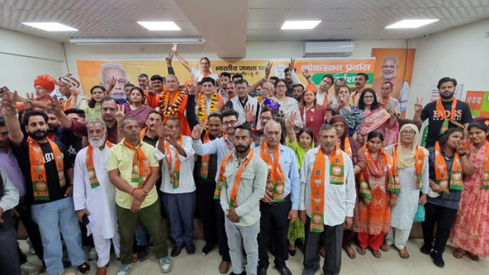 The leaders of various political parties and social organisations who joined BJP at Jammu on Sunday.