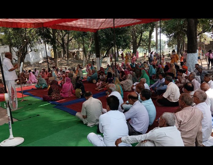 Former minister, Mula Ram addressing Congress meeting in Marh area on Wednesday.