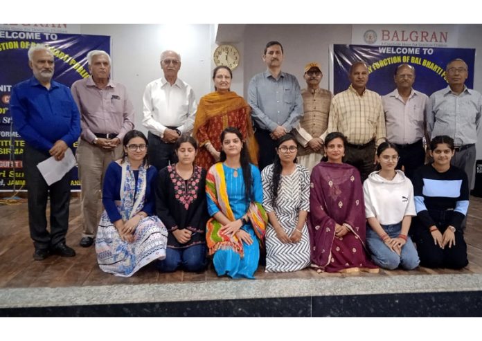 Dignitaries posing along with students of Bal Bharti Public School of Balgran, Channi Rama Jammu on Sunday.