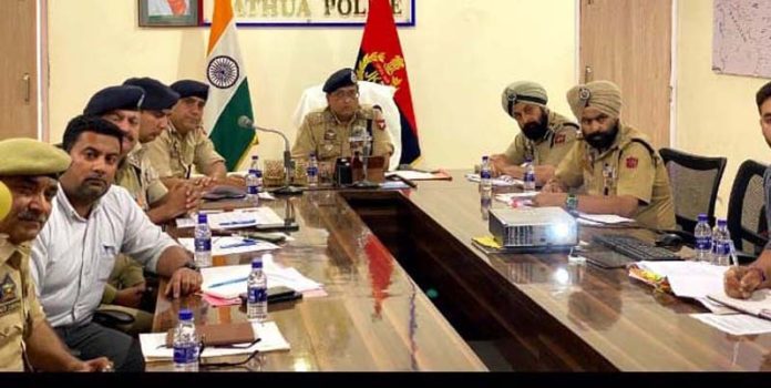 DIG JSK Range, Dr Sunil Gupta, chairing a meeting in Kathua on Monday.