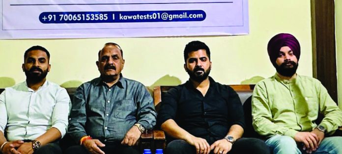 Management of Kawa Group posing during launching of online test and learning platform.