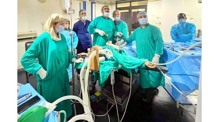 Team of doctors at Sub District Hospital Bhaderwah performing laparoscopic surgery. -Excelsior/Tilak Raj Team of doctors at Sub District Hospital Bhaderwah performing laparoscopic surgery. -Excelsior/Tilak Raj