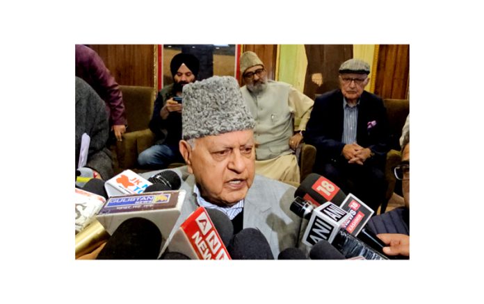 National Conference President, Farooq Abdullah talking to media persons in Srinagar on Tuesday. -Excelsior/Shakeel