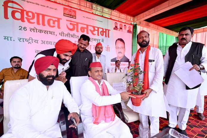 Samajwadi Party President Akhilesh Yadav at a public meeting ahead of Lok Sabha elections, in Pilibhit on Friday. (UNI)