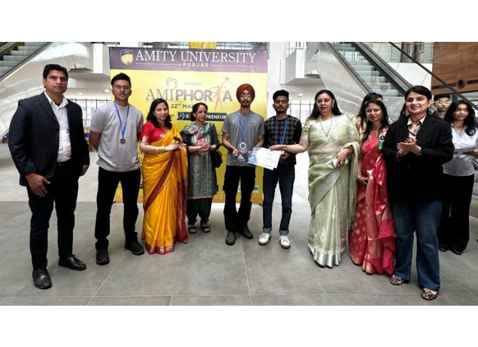 The officials of JUIT felicitating the students participated in Technovation event recently held in Chandigarh.