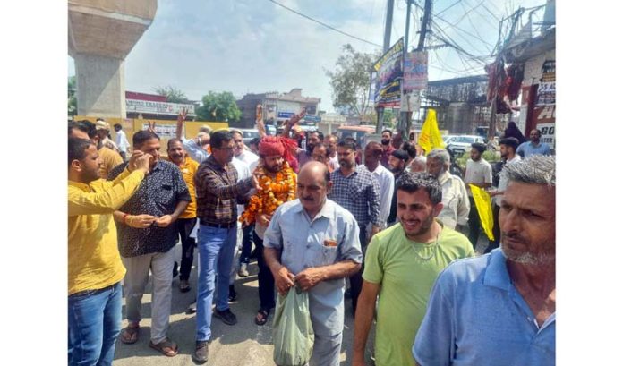 Ankur Sharma canvassing in Samba district on Monday. Ankur Sharma canvassing in Samba district on Monday.