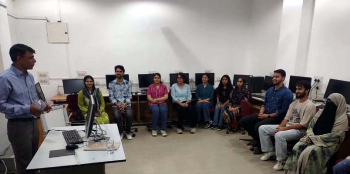 Expert in Library Science Dr Mahendra Singh delivering guest lecture at JU.