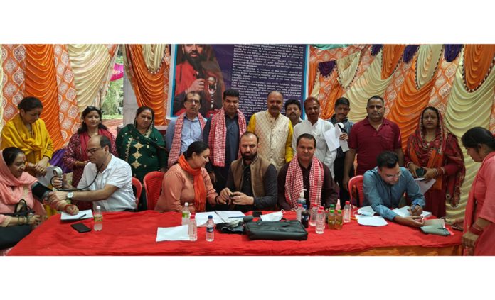 HoD Cardiology Dr Sushil Sharma examining a patient at Nagrota on Sunday. HoD Cardiology Dr Sushil Sharma examining a patient at Nagrota on Sunday.