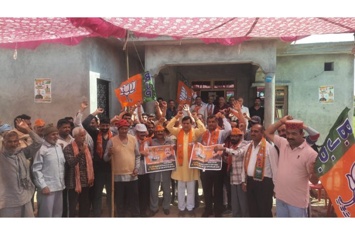 BJP leaders led by Col Mahan Singh (Retired) during an election campaign meeting at Sandhar Panchayat of Kathua district.