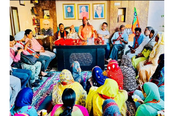 BJP district president Jammu South, Rekha Mahajan addressing a meeting in Bahu Fort area on Sunday. BJP district president Jammu South, Rekha Mahajan addressing a meeting in Bahu Fort area on Sunday.