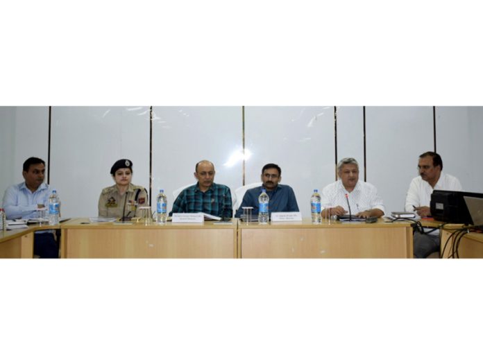 General and Police Observers chairing a meeting at Reasi.