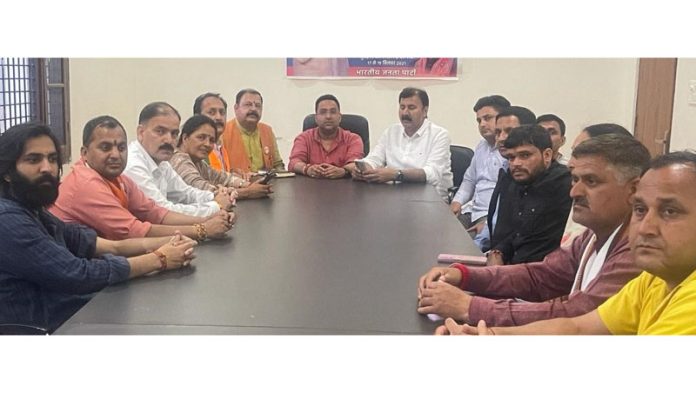 BJP leaders during a meeting in Reasi on Monday. BJP leaders during a meeting in Reasi on Monday.