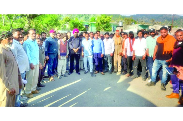 Congress leader, Taranjit Singh Tony along with others posing for a group photograph after a public meeting in Udhampur on Sunday. Congress leader, Taranjit Singh Tony along with others posing for a group photograph after a public meeting in Udhampur on Sunday.