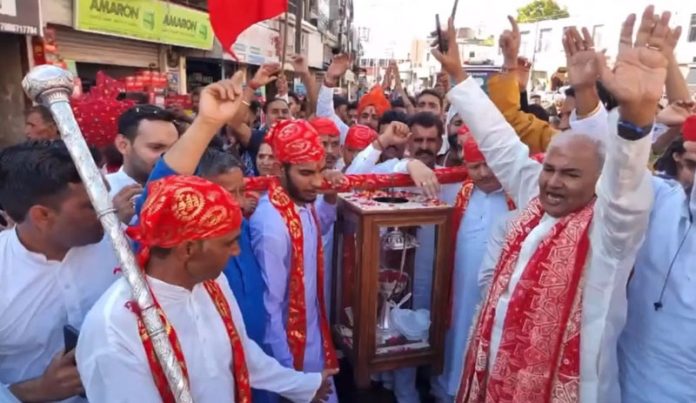 Shiv Sena leader Ashok Gupta with supporters during Charri Yatra to Mata Vaishno Devi shrine. Shiv Sena leader Ashok Gupta with supporters during Charri Yatra to Mata Vaishno Devi shrine.