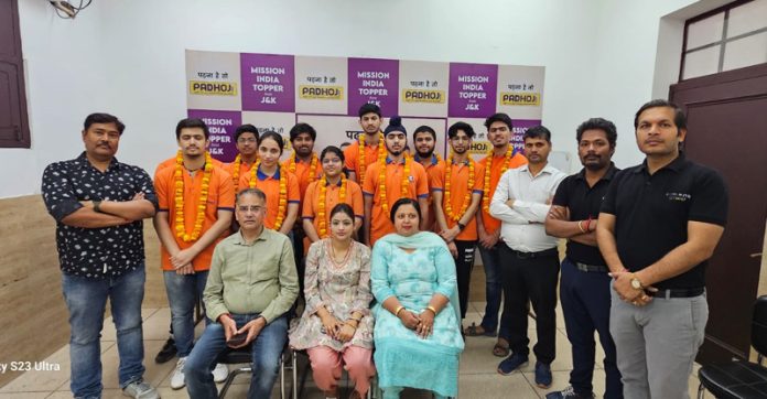 The students of Padhoji posing along with the faculty members in Jammu on Thursday.