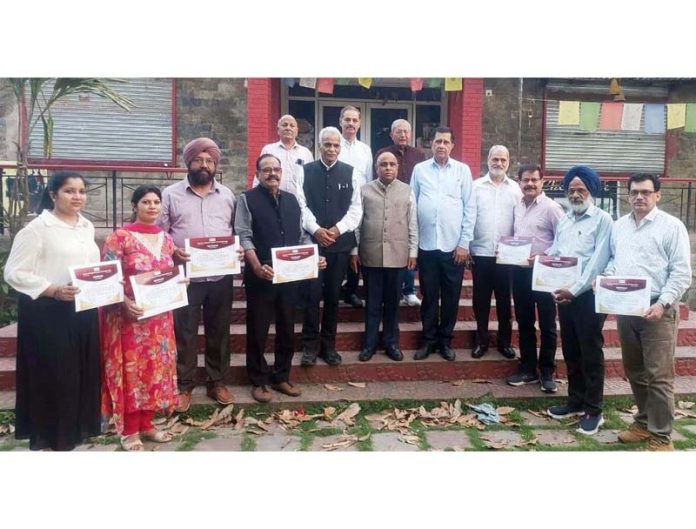 Suresh Kumar Gupta, Principal Secy, Dept of Culture along with others posing for a group photograph during culmination of National Painters' Camp at Mansar. Suresh Kumar Gupta, Principal Secy, Dept of Culture along with others posing for a group photograph during culmination of National Painters' Camp at Mansar.