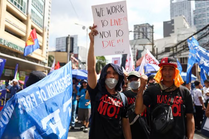 Workers and activists across Asia and Europe hold May Day rallies to call for greater labour rights
