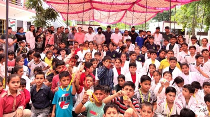 Judo Athletes posing along with dignitaries during closing ceremony at Jammu on Sunday. Judo Athletes posing along with dignitaries during closing ceremony at Jammu on Sunday.