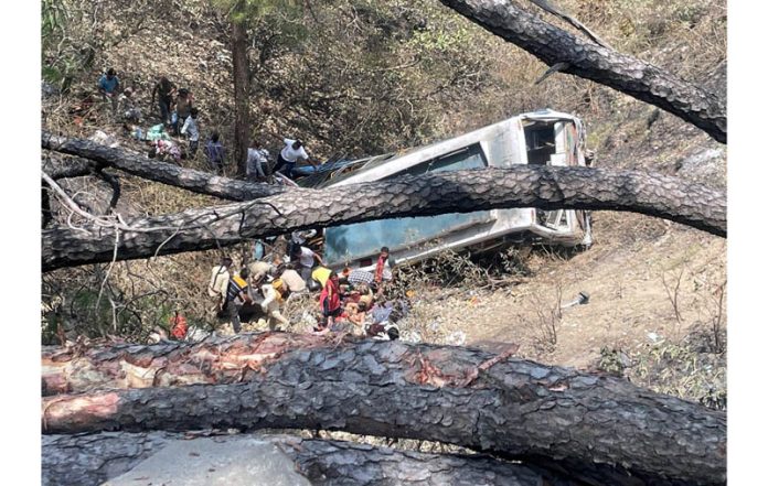 Police and locals launch rescue operation after bus carrying pilgrims rolled down into a gorge near Akhnoor on Jammu-Poonch highway on Thursday. Police and locals launch rescue operation after bus carrying pilgrims rolled down into a gorge near Akhnoor on Jammu-Poonch highway on Thursday.