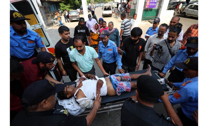 A bus accident victim being shifted to GMC Jammu on Thursday. -Excelsior/Rakesh