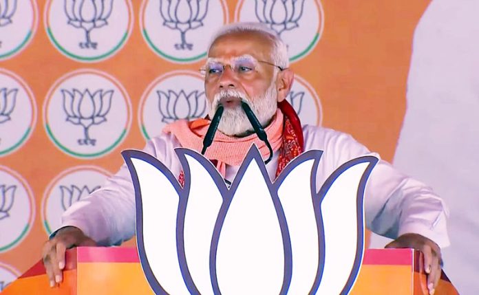 Prime Minister Narendra Modi addresses a rally in Azamgarh on Thursday. (UNI) Prime Minister Narendra Modi addresses a rally in Azamgarh on Thursday. (UNI)