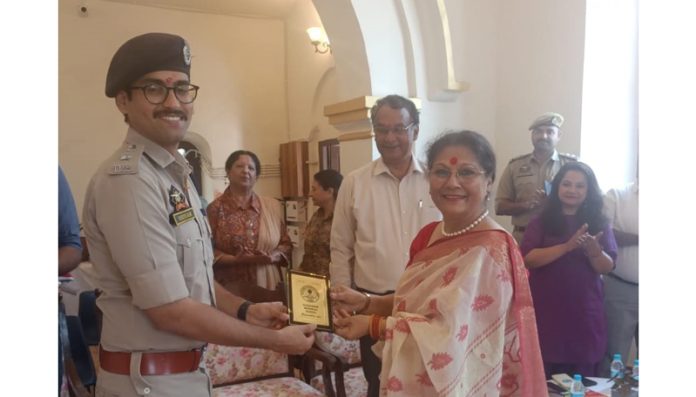 Principal Alexander Memorial School, Esther William presenting a memento to SP City North Jammu, Shivam Siddharth. Principal Alexander Memorial School, Esther William presenting a memento to SP City North Jammu, Shivam Siddharth.