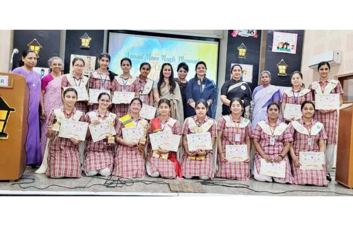 Students displaying certificates while posing with dignitaries during debate competition on Tuesday. Students displaying certificates while posing with dignitaries during debate competition on Tuesday.