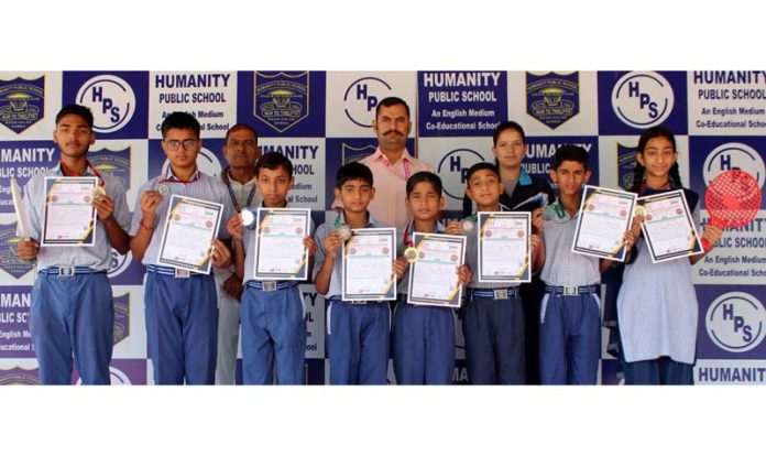 Students of Humanity Public School posing along with the Principal. Students of Humanity Public School posing along with the Principal.
