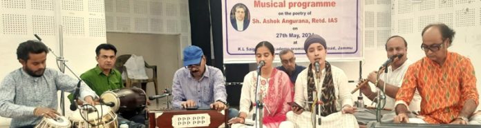 Artists performing during musical evening organised by JKAACL at Writers Club Jammu.