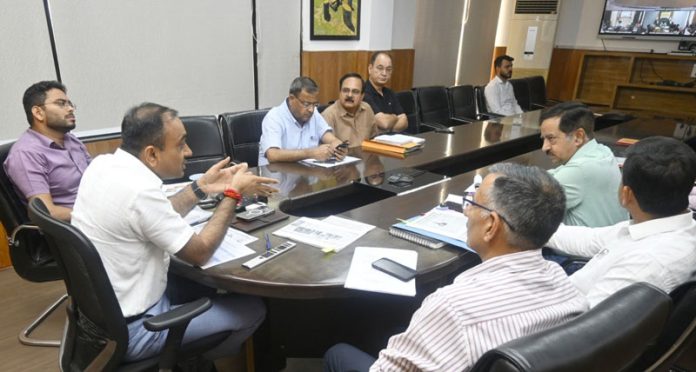 Divisional Commissioner Jammu Ramesh Kumar chairing a meeting. Divisional Commissioner Jammu Ramesh Kumar chairing a meeting.