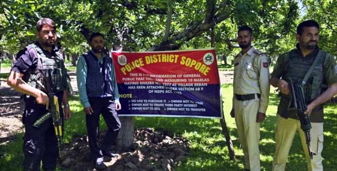 Police Attach Properties Of Notorious Drug Peddler In J&K's Sopore Police Attach Properties Of Notorious Drug Peddler In J&K's Sopore