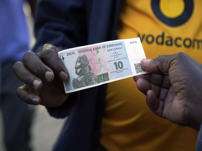 Zimbabwe authorities mix charm with force in an attempt to shore up the world's newest currency