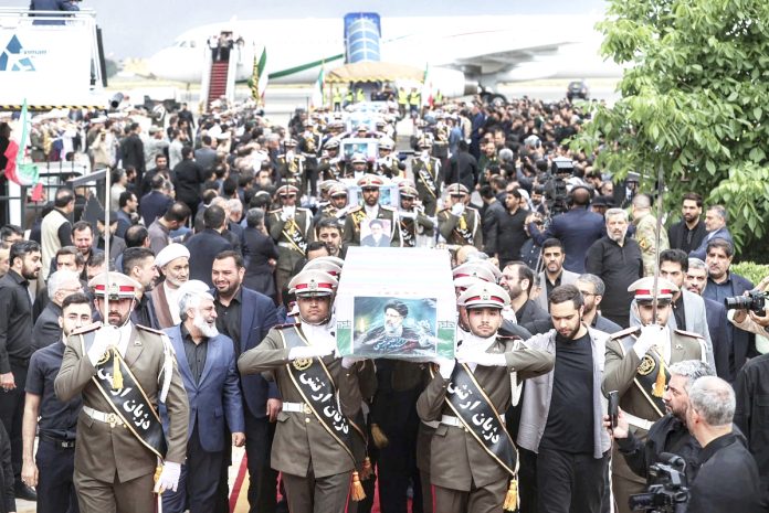 Iran's supreme leader presides over funeral for President and others killed in helicopter crash Iran's supreme leader presides over funeral for President and others killed in helicopter crash