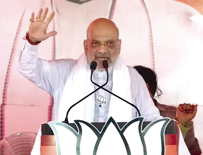 Amit Shah addressing rally at Maharajganj, Uttar Pradesh on Wednesday.