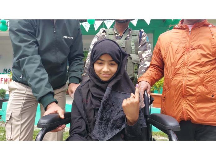 A first time voter displays ink mark in Ganderbal. -Excelsior/Firdous A first time voter displays ink mark in Ganderbal. -Excelsior/Firdous