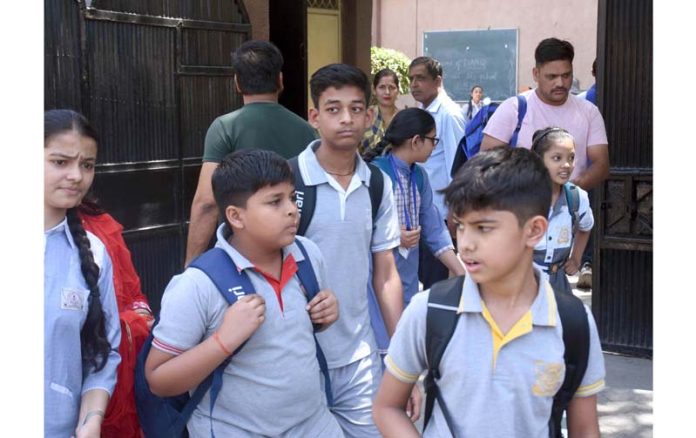 Students coming out of their school after a bomb hoax mail was received by several schools in New Delhi.(UNI) Students coming out of their school after a bomb hoax mail was received by several schools in New Delhi.(UNI)