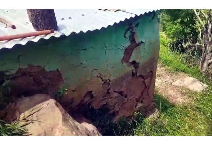 Cracks in a house due to land sinking. - Excelsior/K Kumar