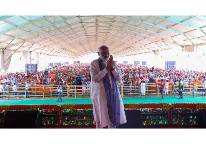 Prime Minister Narendra Modi at a public meeting for Lok Sabha elections in Dumka district, Jharkhand on Tuesday. (UNI) Prime Minister Narendra Modi at a public meeting for Lok Sabha elections in Dumka district, Jharkhand on Tuesday. (UNI)