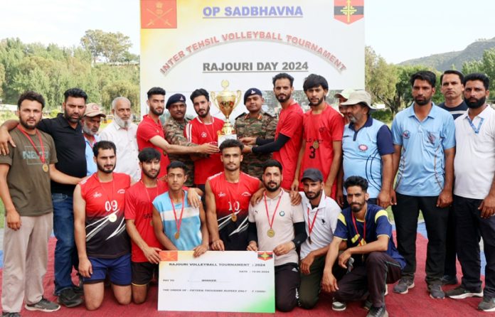 Winning team posing with trophy and cheque at ALG Rajouri.