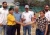 Captains of Kabaddi teams posing with chief guest and other officials before toss.