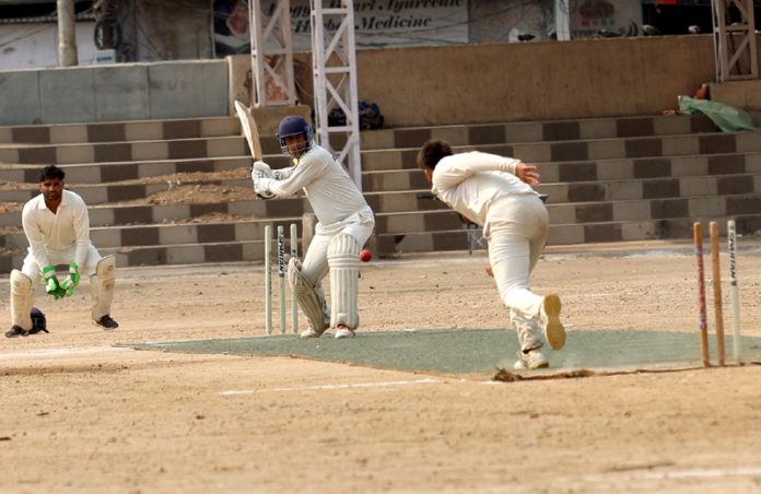 Batsman playing a shot during a match at Parade Ground, Jammu.—Excelsior/Rakesh Batsman playing a shot during a match at Parade Ground, Jammu.—Excelsior/Rakesh