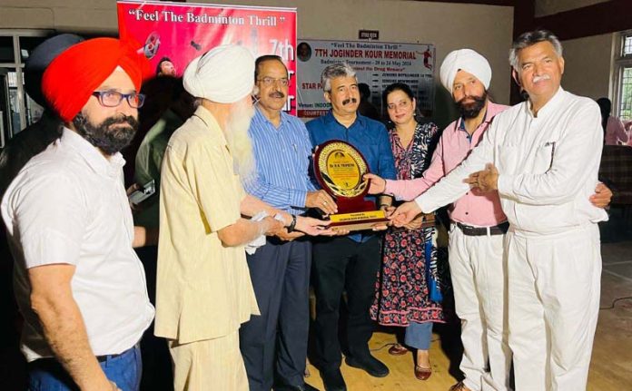 Joginder Kour Memorial Trust management presenting memento to Vice Chancellor SKUAST-Jammu, Prof. B.N. Tripathi and Arun Manhas, Director Industries and Commerce, Jammu. Joginder Kour Memorial Trust management presenting memento to Vice Chancellor SKUAST-Jammu, Prof. B.N. Tripathi and Arun Manhas, Director Industries and Commerce, Jammu.