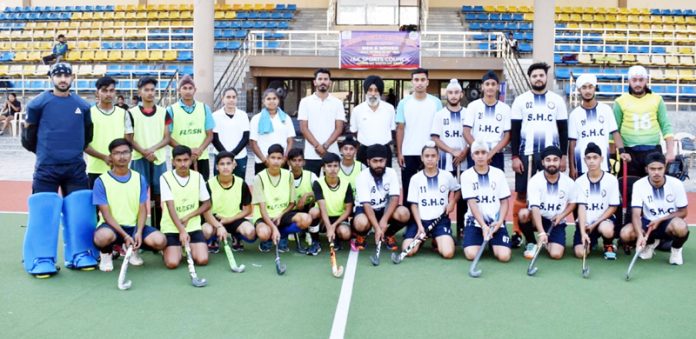 Players of a team posing with guests before start of their match at KK Hakku Stadium, Jammu. Players of a team posing with guests before start of their match at KK Hakku Stadium, Jammu.