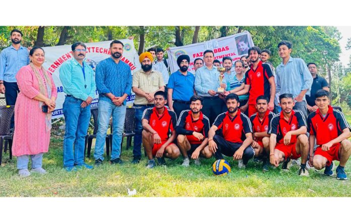 Er Arun Bangotra, Principal Government Polytechnic College Jammu posing along with Volleyball players and teaching faculty. Er Arun Bangotra, Principal Government Polytechnic College Jammu posing along with Volleyball players and teaching faculty.