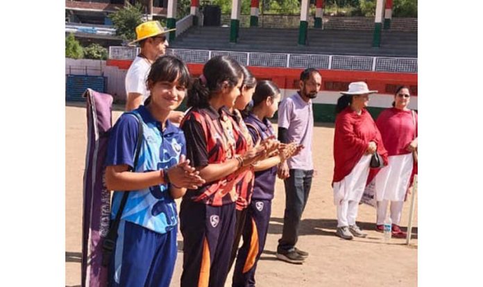 Students welcoming the chief guest at Doda.