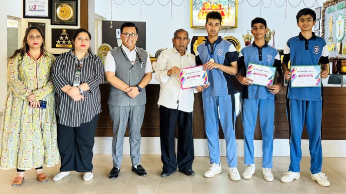 Management of DPS Udhampur presenting certificates to students. Management of DPS Udhampur presenting certificates to students.