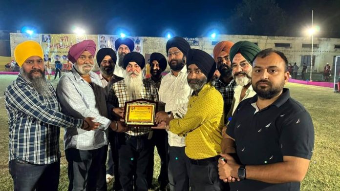 Management Committee presenting memento to the chief guest.