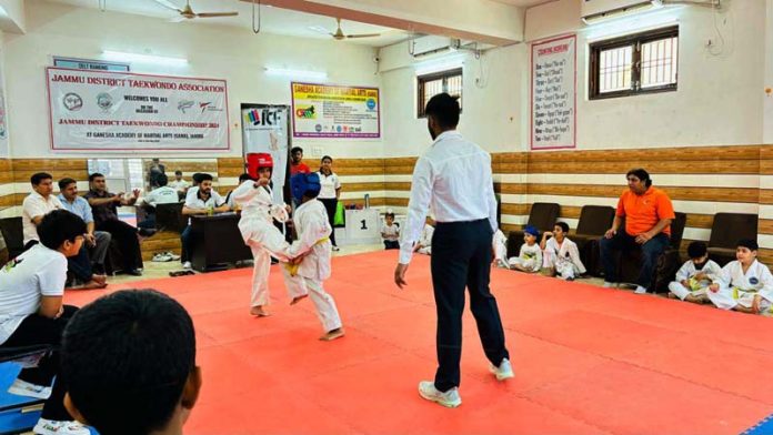 Taekwondo players in action during District Championship at Jammu. Taekwondo players in action during District Championship at Jammu.