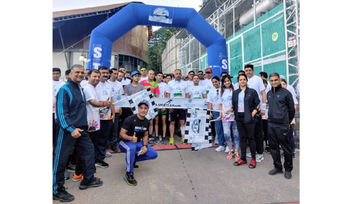Winners of fourth edition of Patnitop Marathon posing for a group photograph along with dignitaries.